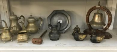 A shelf of brass & pewter including tea set & bell gong etc.