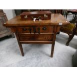 A rustic style chest of drawers.