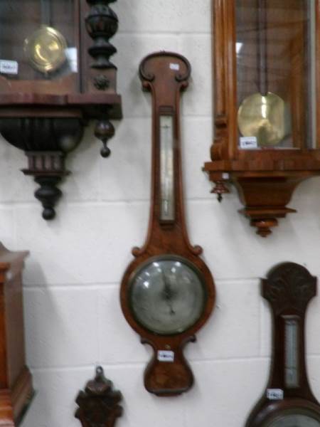 A 19th century mahogany banjo barometer.