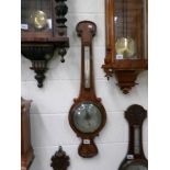 A 19th century mahogany banjo barometer.