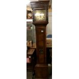 An early 19th century 8 day long case clock with single finger brass dial, in good working order,