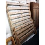 A double pine bedstead complete with mattress.