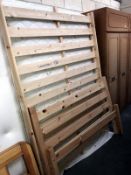 A double pine bedstead complete with mattress.