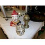 A clown mechanical money box, a crown money box and an unusual brass box.