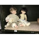 2 porcelain head collectors dolls and a teddy bear.