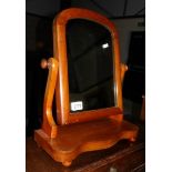 A Victorian mahogany toilet mirror.