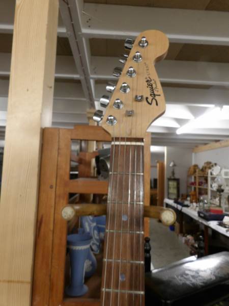 A Red Squire Strat guitar with 10w Park amp and lead. - Image 3 of 4