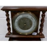 An oak aneroid barometer,.