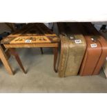 2 vintage suitcases and a musical side table