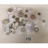 41 silver foreign coins, approximately 270 grams.