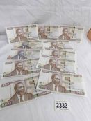 9 x 1000 and 2 x 100 Kenyan bank notes.