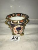 A Royal Crown Derby 2 handled loving cup.