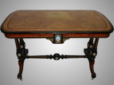 A 19th century Liberty table inset with 20 Sevres plaques.
