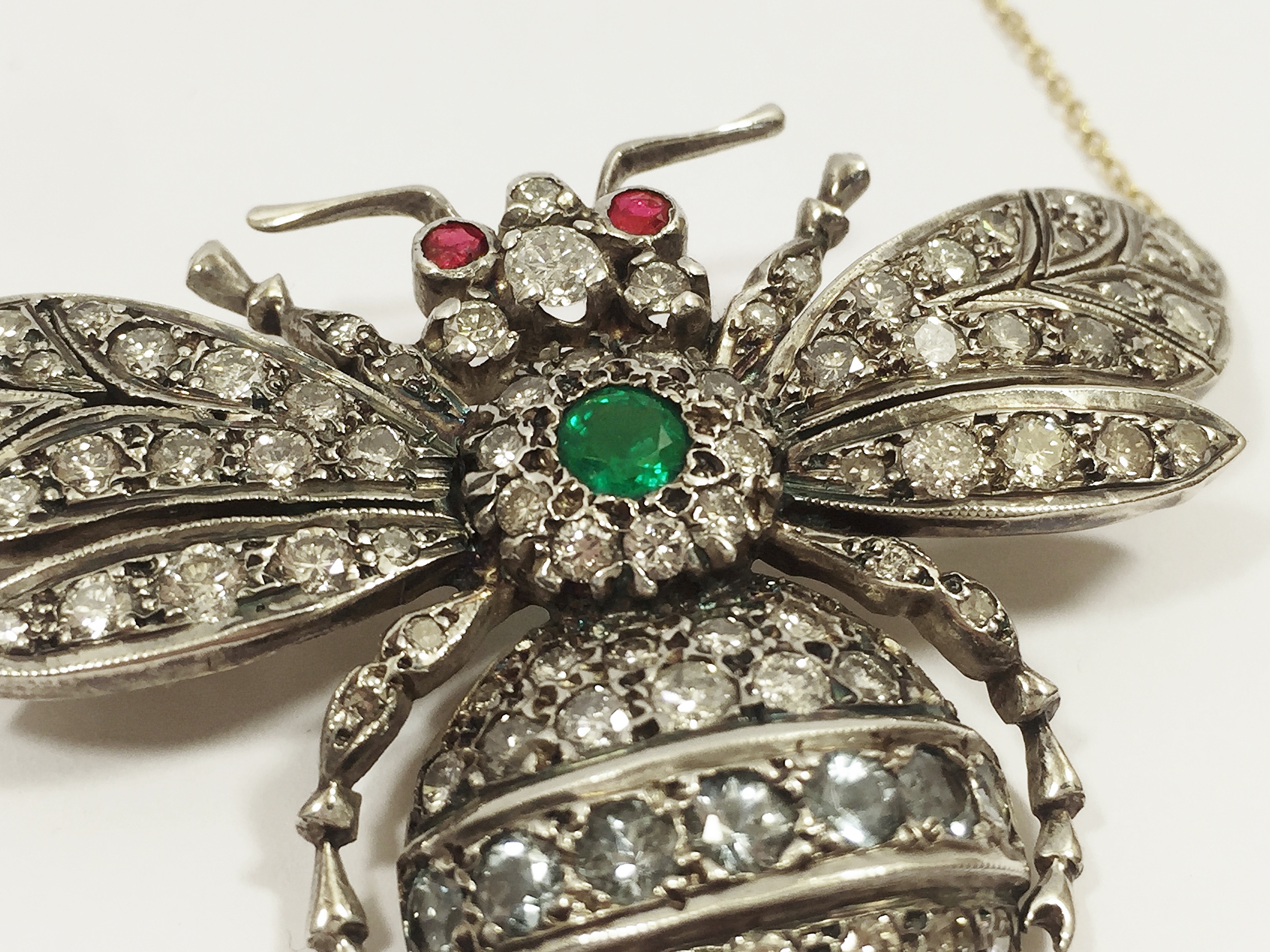 An outstanding 9ct gold 'Bee' pendant with 4 carats of diamonds, central set emerald and ruby eyes. - Image 2 of 5