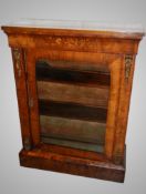A Victorian walnut and marquetry pier cabinet.