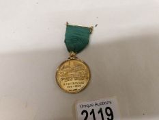 A Ruston's silver 50 year service medal awarded to G. F. Spittlehouse, 1914 -1964.