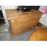 A pine 3 drawer chest.