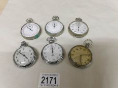 4 stop watches and 2 pocket watches,