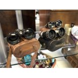 3 early sets of binoculars