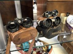 3 early sets of binoculars