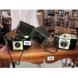 3 vintage camera's.