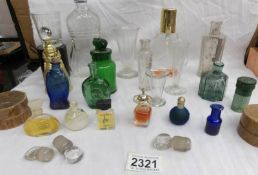 An interesting collection of old medicine, scent and other bottles etc.