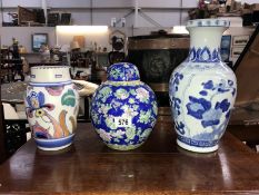 2 vases and a lidded ginger jar.