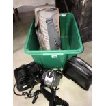 2 boxed pairs of binoculars and a Sony video 8 camcorder.