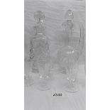 2 superb quality cut glass decanters together with 7 glasses.
