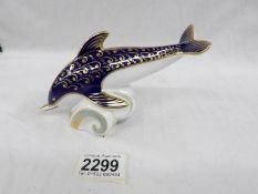 A Royal Crown Derby dolphin with stopper.