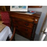 A Victorian mahogany Scotch chest with barley twist columns.