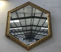 An ornate hexaganal mirror