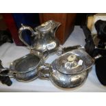 A 4 piece engraved silver plated tea set.
