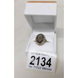 A 9ct gold ring set smoky quartz stone, size N. Gross weight 5 grams.