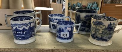 Three 19th century loving cups & three 19th century mugs all in blue glaze pictorial design