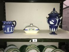 A Wedgwood blue jasper ware urn, a jug and an M Forester 1925 Henley tureen.