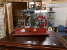 A model stationary engine.