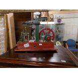 A model stationary engine.