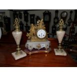 A 3 piece clock garniture.