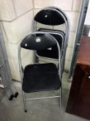 3 folding tubular metal chairs.