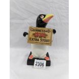 An original Carlton ware Guinness penguin table lamp base.