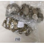 250 2/- coins, 350 sixpences and 200 threepenny bits.