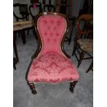 A mahogany framed ladies chair.