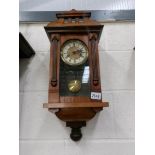 A small Victorian mahogany 8 day wall clock, in working order.