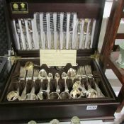 A cased Arthur Price of England Kings pattern cutlery set with 8 napkin rings.