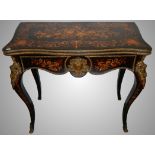 An exceptional 19th century French ebony and marquetry card table.