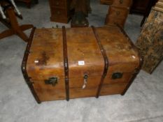 A large old cabin trunk.