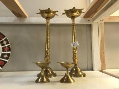 2 pairs of brass Islamic candlesticks