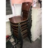 A set of 8 retro style stackable chairs.