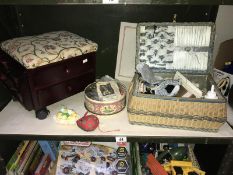 A vintage wicker sewing basket and contents, tin of buttons, work stool etc.